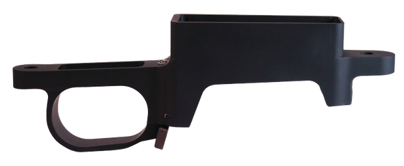 Side view of Hawkins Precision Remington Short Action Detachable Box Magazine (DBM) with M5 standard SA latch, model number 310-0002.1. This piece features a sleek, black finish and a prominent, ergonomic trigger guard. It is designed for tactical shooting applications, emphasizing durability and ease of magazine changes.